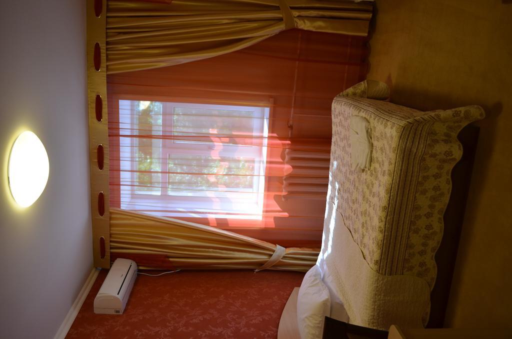Mereke Hotel Ustʼ-Kamenogorsk Quarto foto